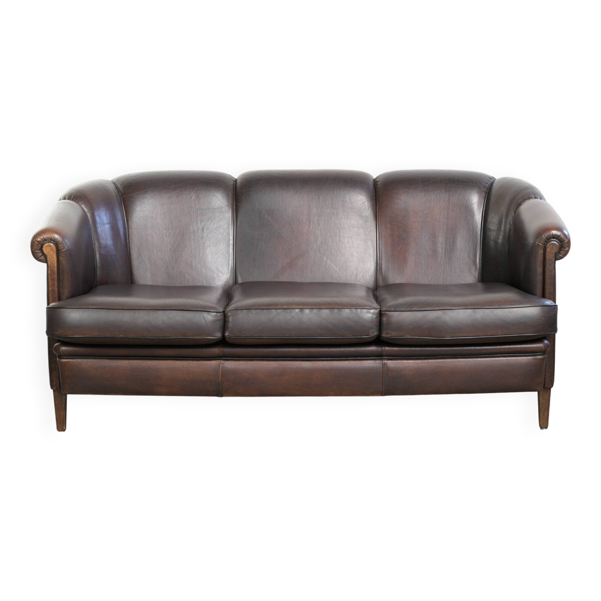 Unique sheepskin 3-seater sofa with deep colours and a distinctive design