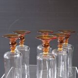6 amber-footed champagne flutes in very good condition.