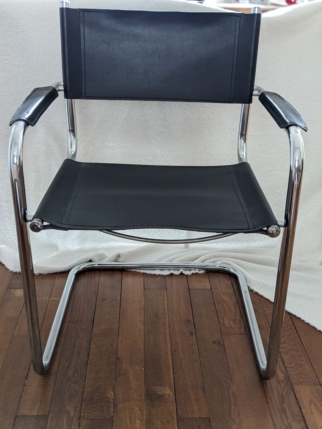 Vintage designer leather and metal armchair