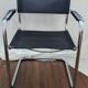 Vintage designer leather and metal armchair