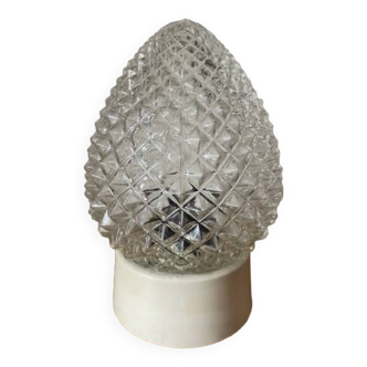 Diamond tip glass wall lamp in the shape of a bread apple.