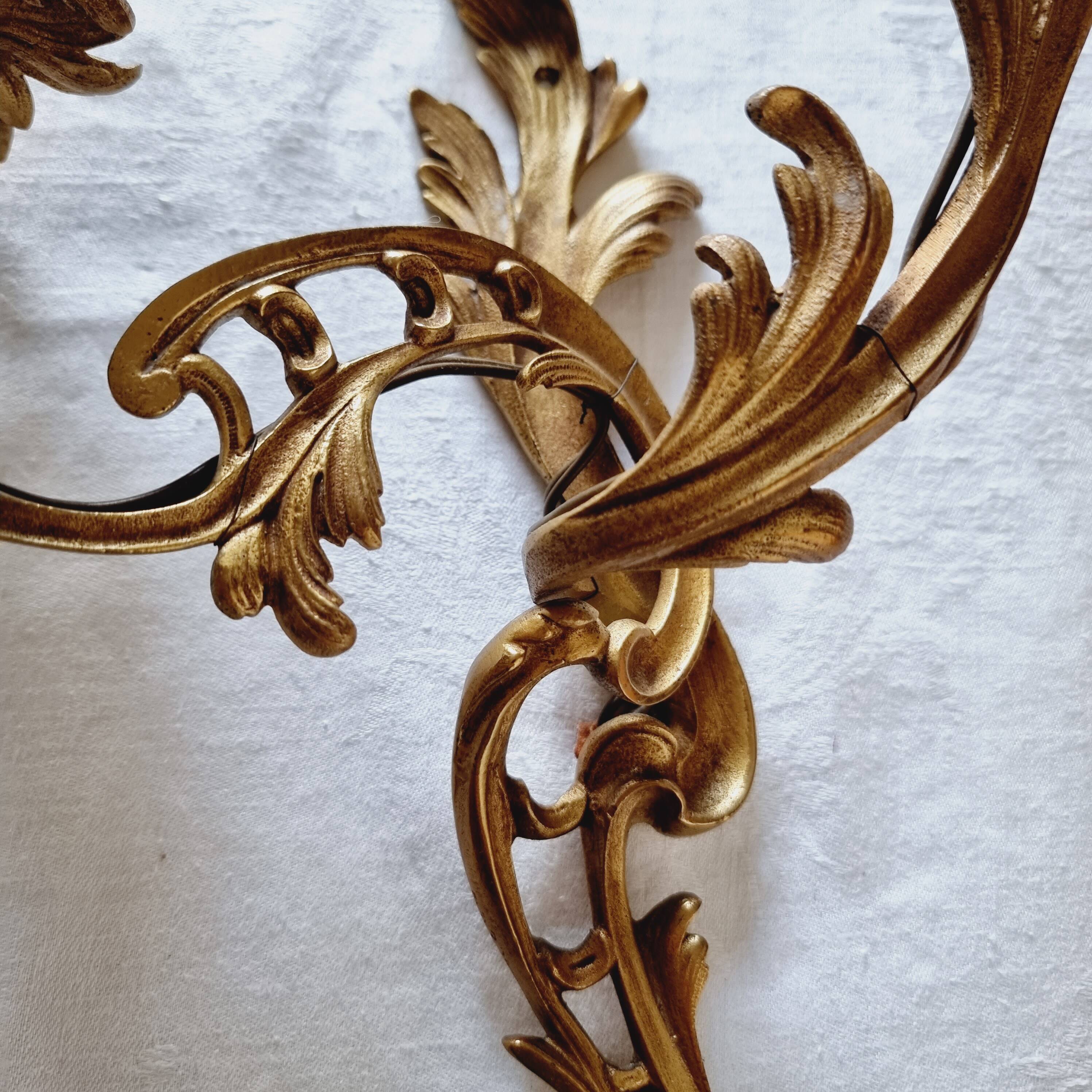 Pair of vintage French wall sconces in bronze, Louis XV Rococo style.