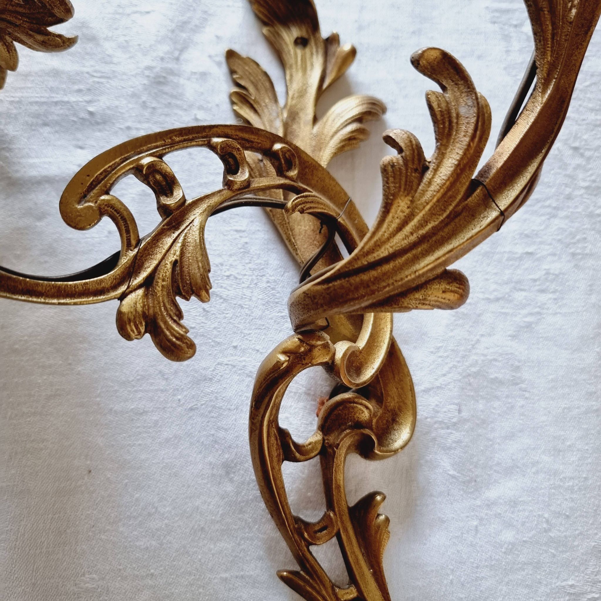 Pair of vintage French wall sconces in bronze, Louis XV Rococo style.