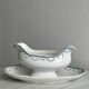 Antique porcelain sauceboat with tray
