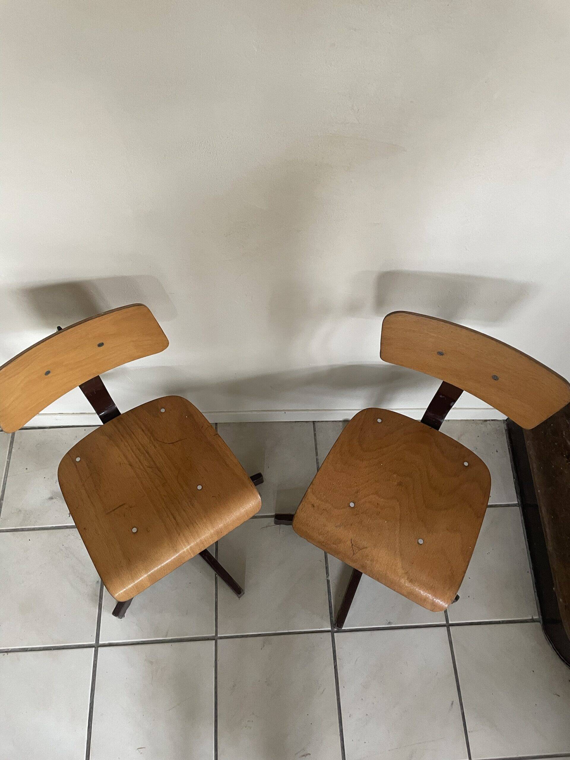 Pair of industrial swivel chairs