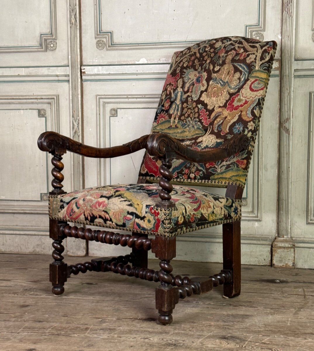 Carved walnut and tapestry armchair, late 17th century