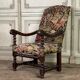 Carved walnut and tapestry armchair, late 17th century