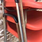 3 chairs with armrests Robin Day