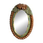 Miroir ovale en bois sculpté