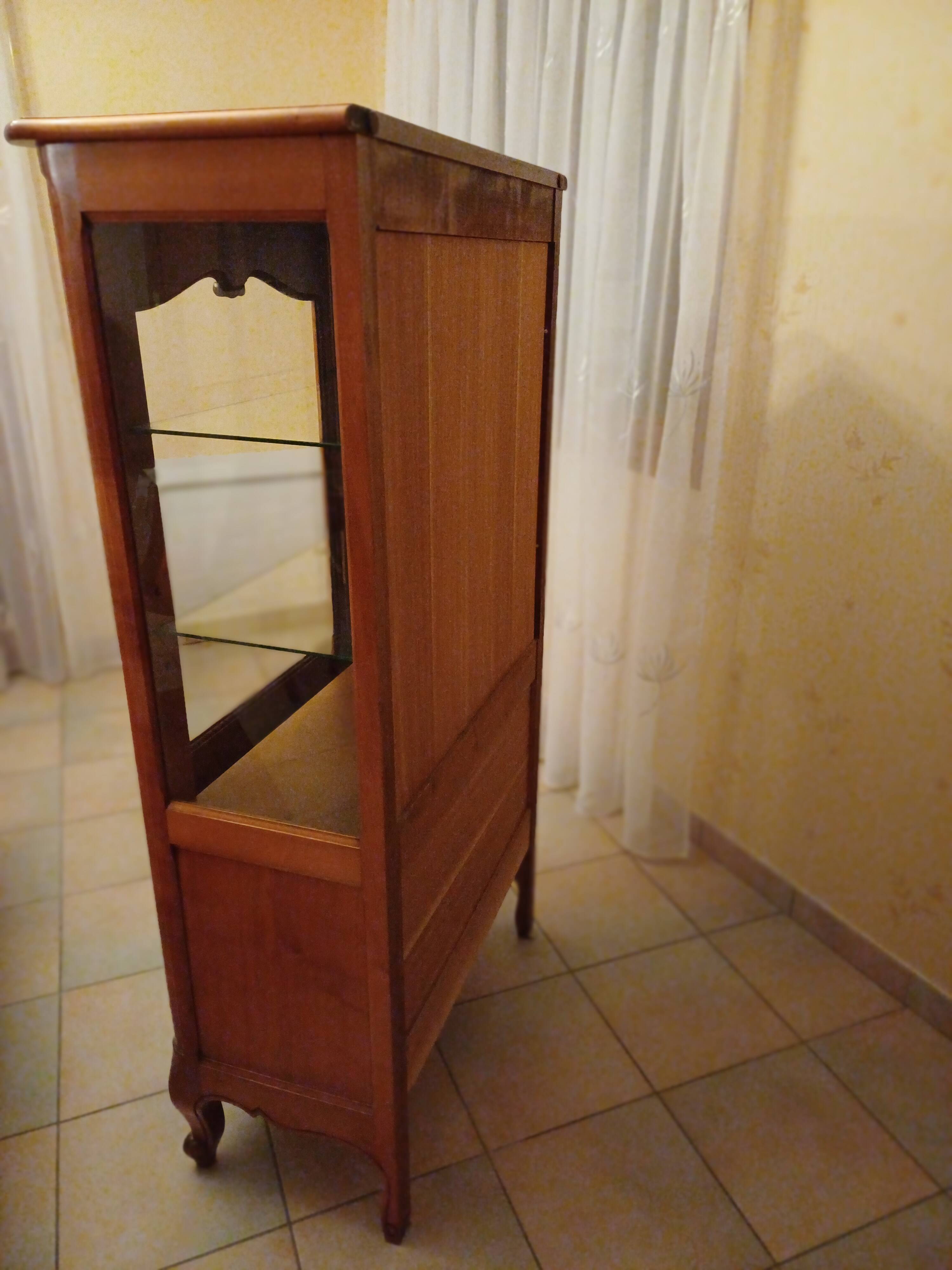 Solid wood display cabinet.