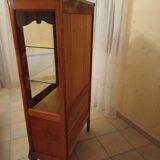 Solid wood display cabinet.