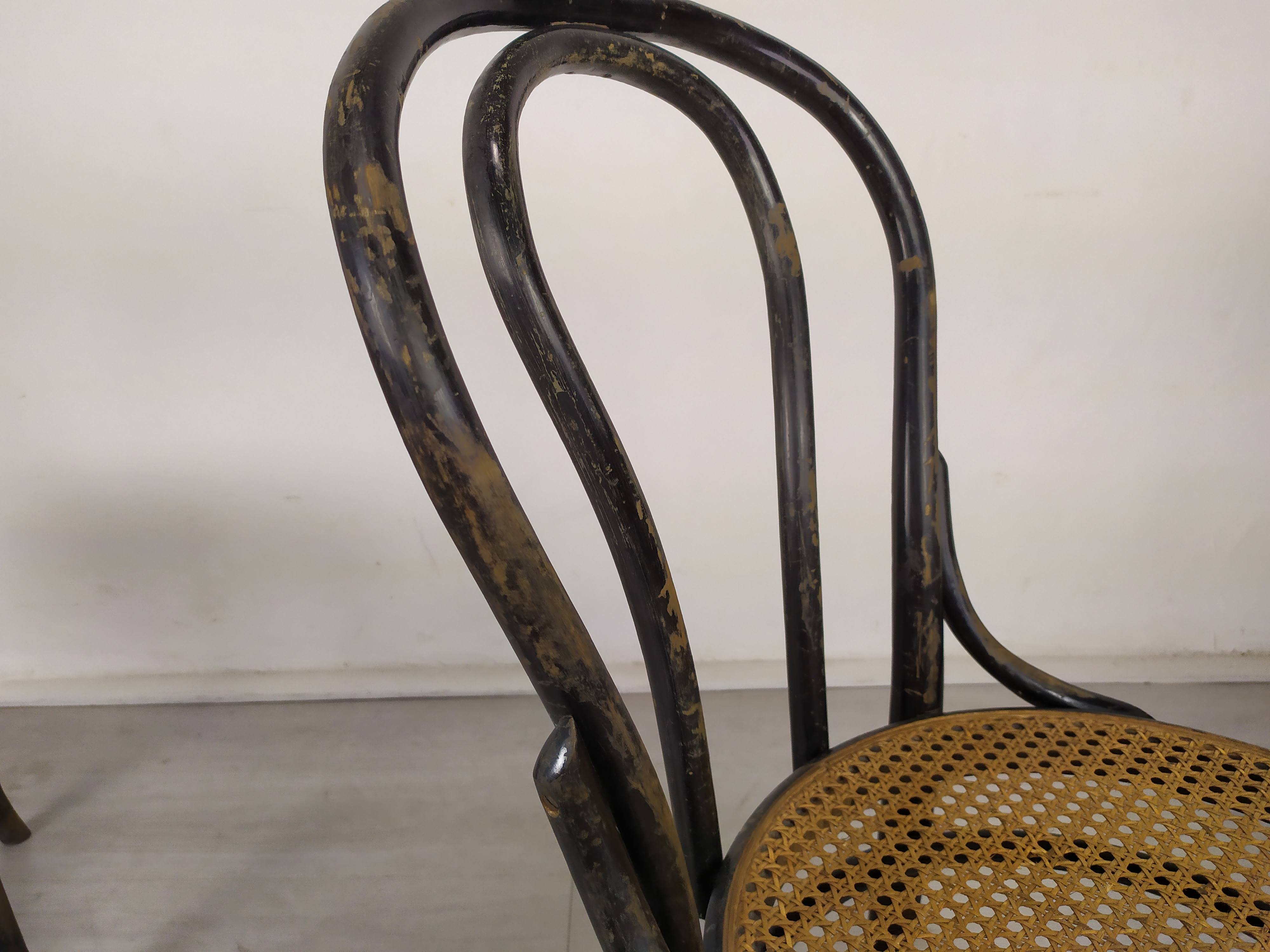 Black canned bistro chairs