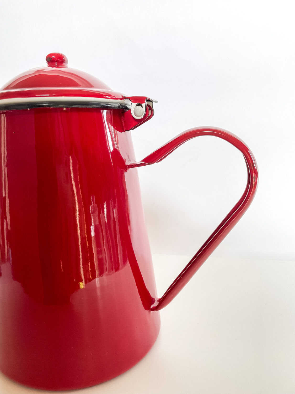 Red enamelled coffee maker