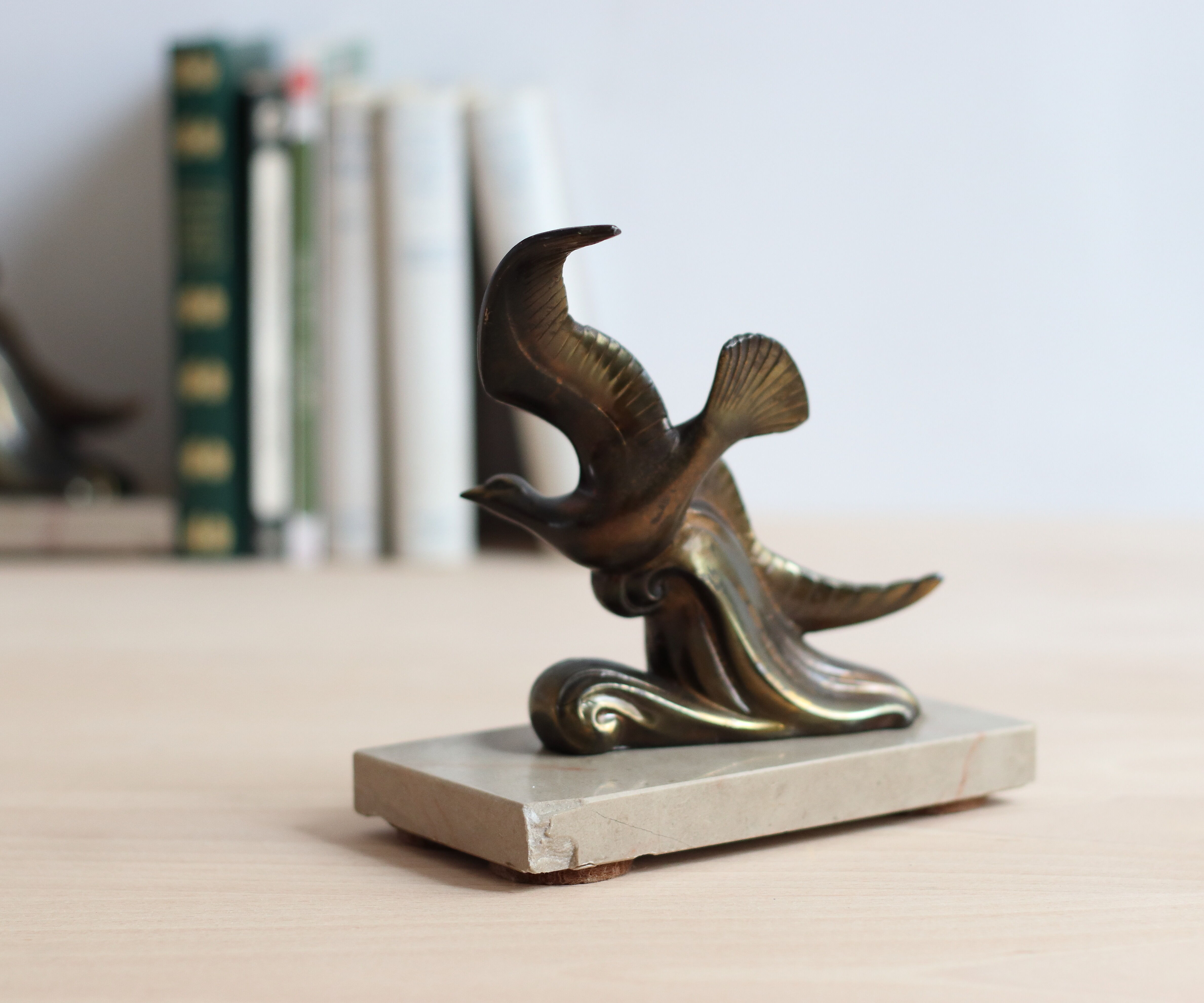 Pair of art deco seagull bookends in regulation and marble