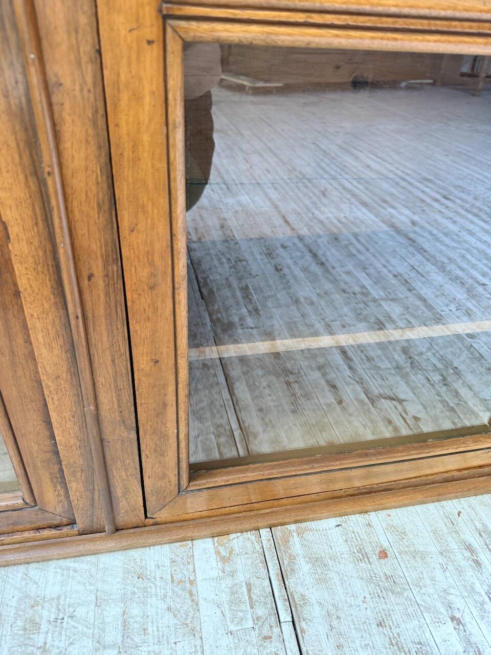 Glass-fronted walnut library 1900