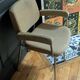 vintage tubular metal chrome office chair with patterned fabric.