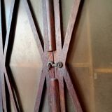 Small antique wall cabinet in Gothic style.