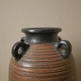 Vase with handles in vintage ceramic handmade pottery tribal ethnic decoration