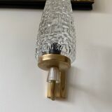 Gold metal and chiseled glass wall sconce