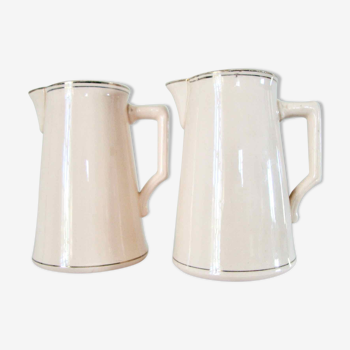 2 pitchers in powder pink earthenware