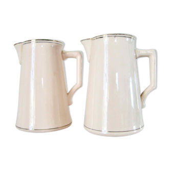 2 pitchers in powder pink earthenware