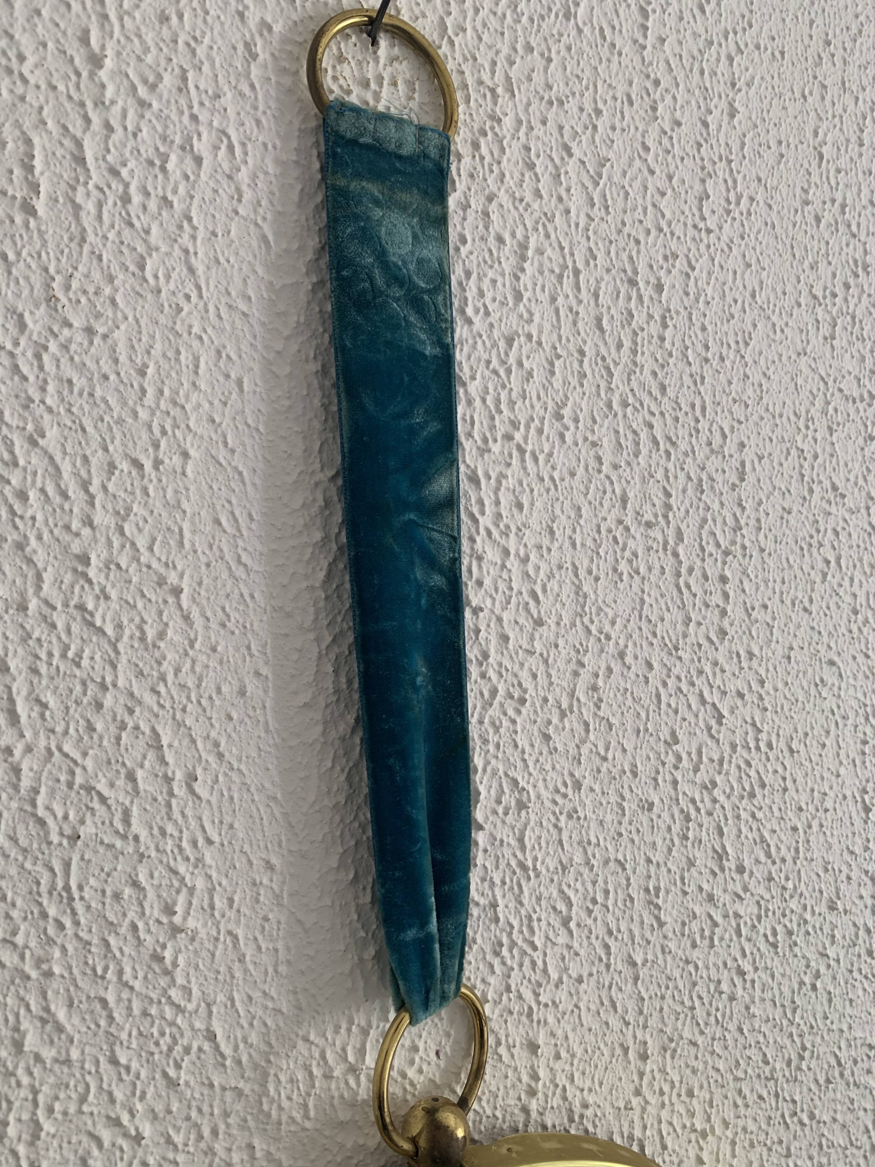 Vintage 1960s witch's eye mirror, turquoise velvet, sunburst effect - 24 x 54 cm