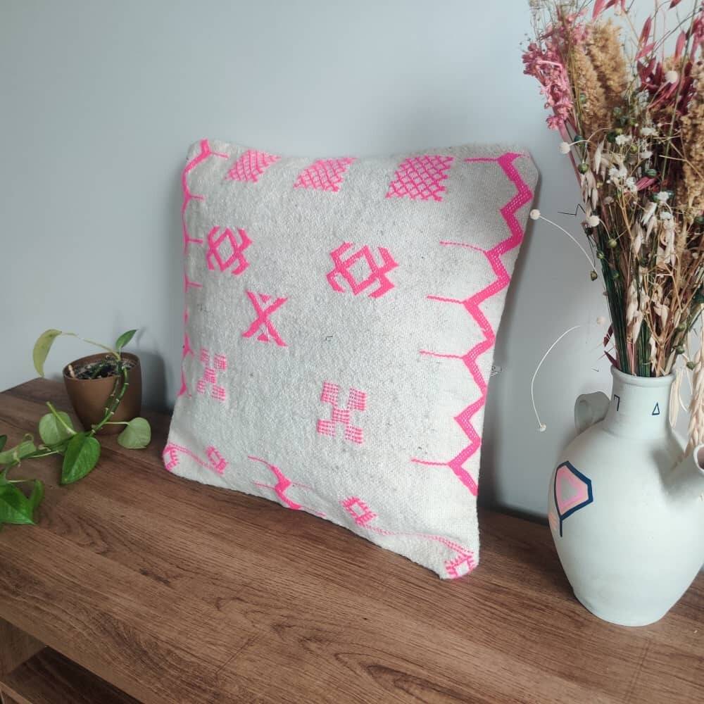 Pink and white bohemian Berber cushion
