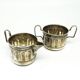 Set of sugar bowl and milk jug, neoclassicism with art deco influences, silver-plated brass, Belgium, 1930s.