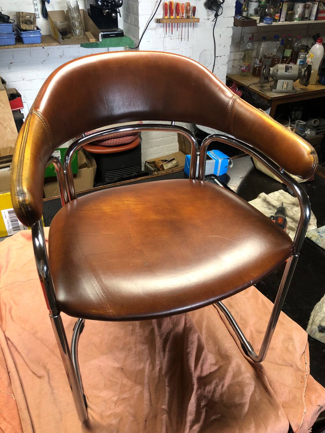 Pair of vintage armchairs, cognac leather and chrome steel 1970