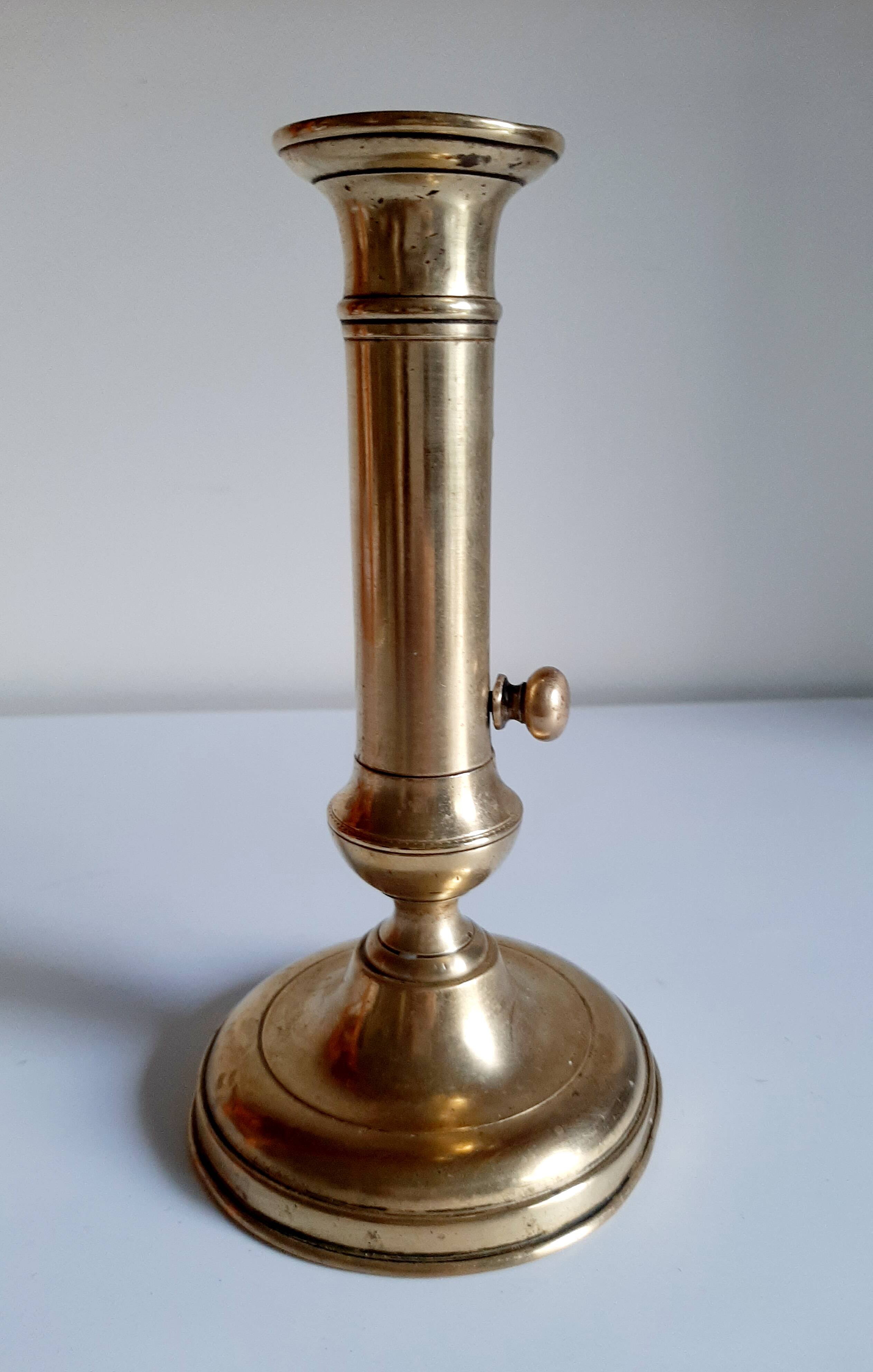 Golden brass candle holder