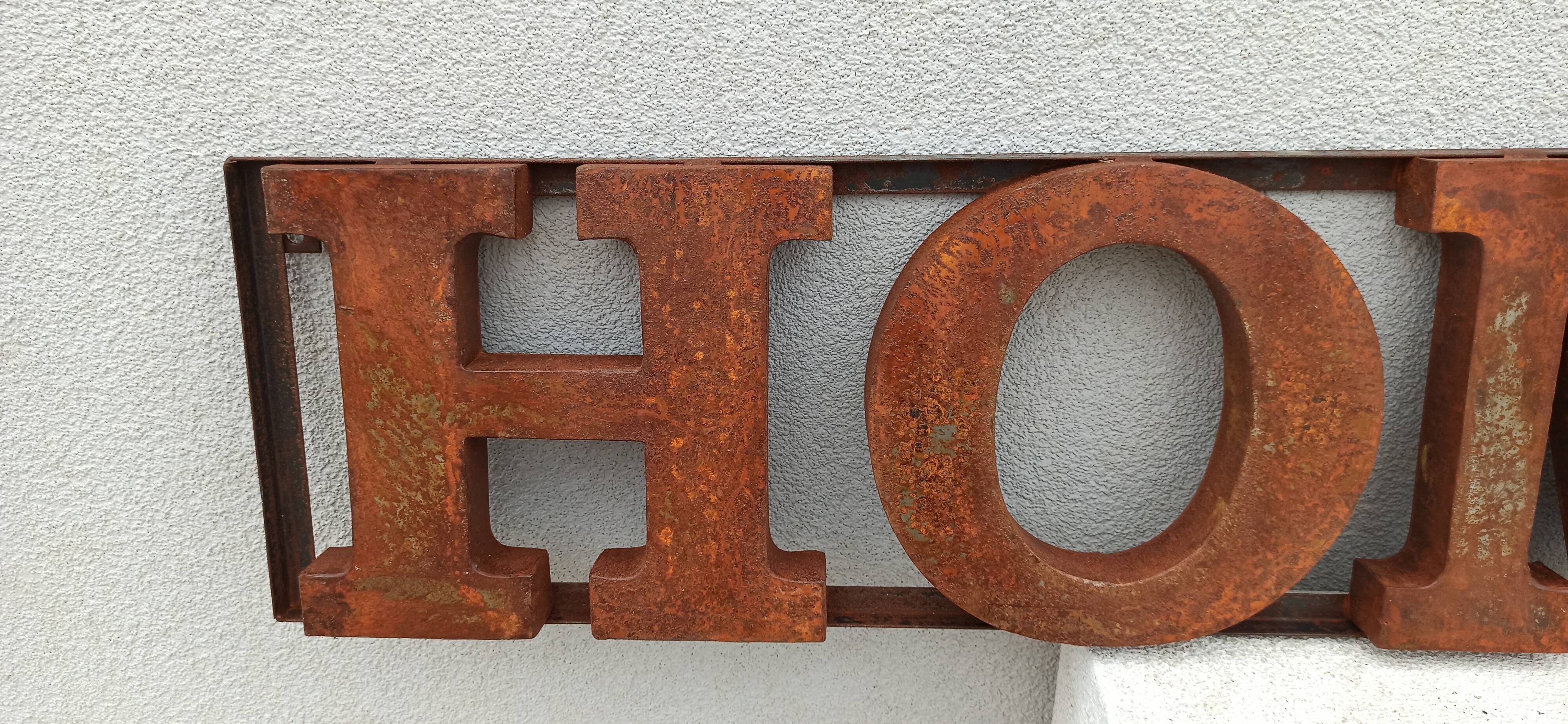 HOME rusty metal sign