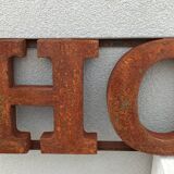 HOME rusty metal sign