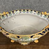 Earthenware planter with polychrome enamelled decoration on a blue background