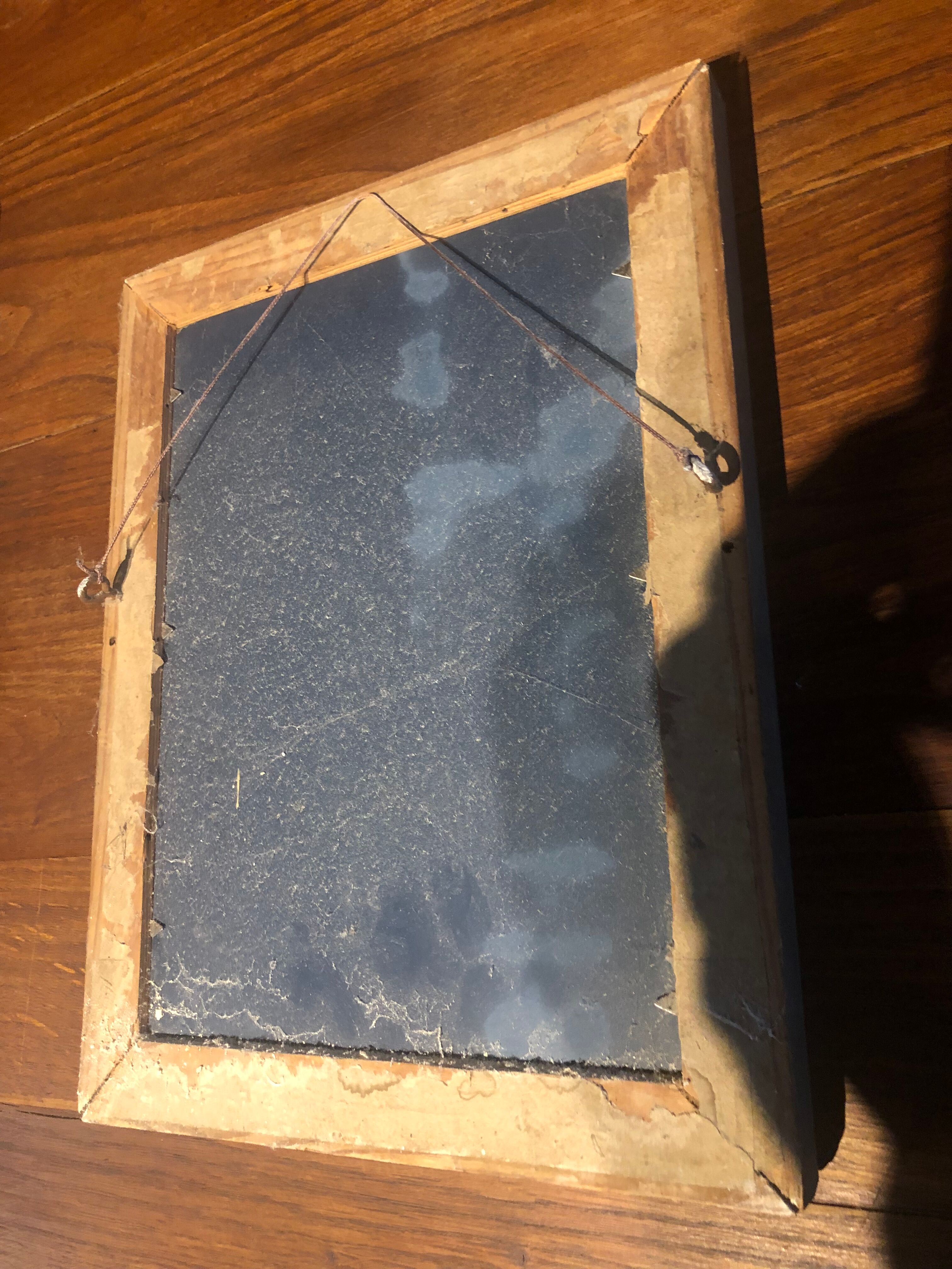 Small carved mirror 22x32cm