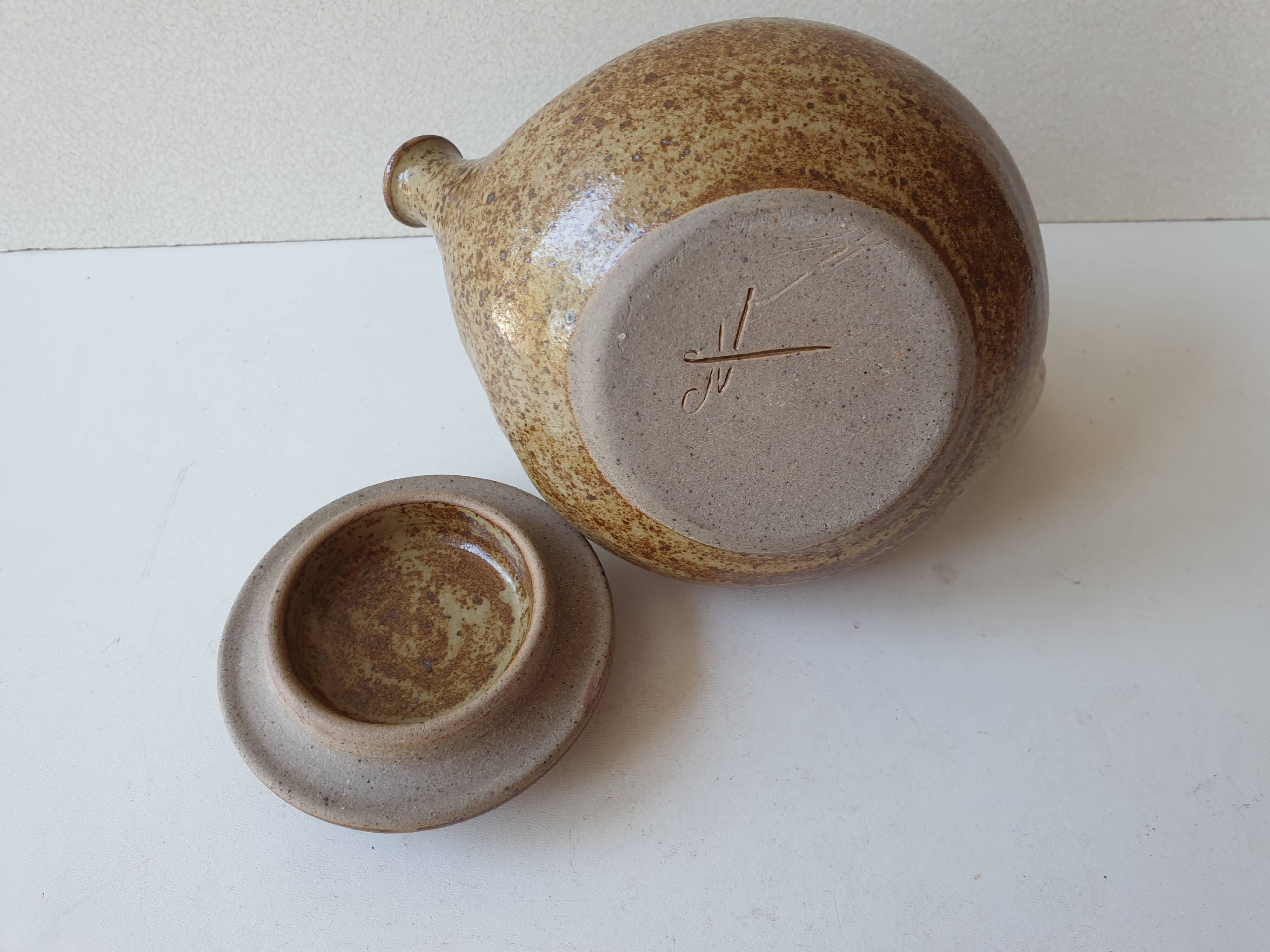 Small teapot in pyrite stoneware ceramic signed NC (Signature to be identified)