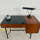 French modernist desk from the 1950s with 2 drawers, 1 cabinet, and 1 container.
