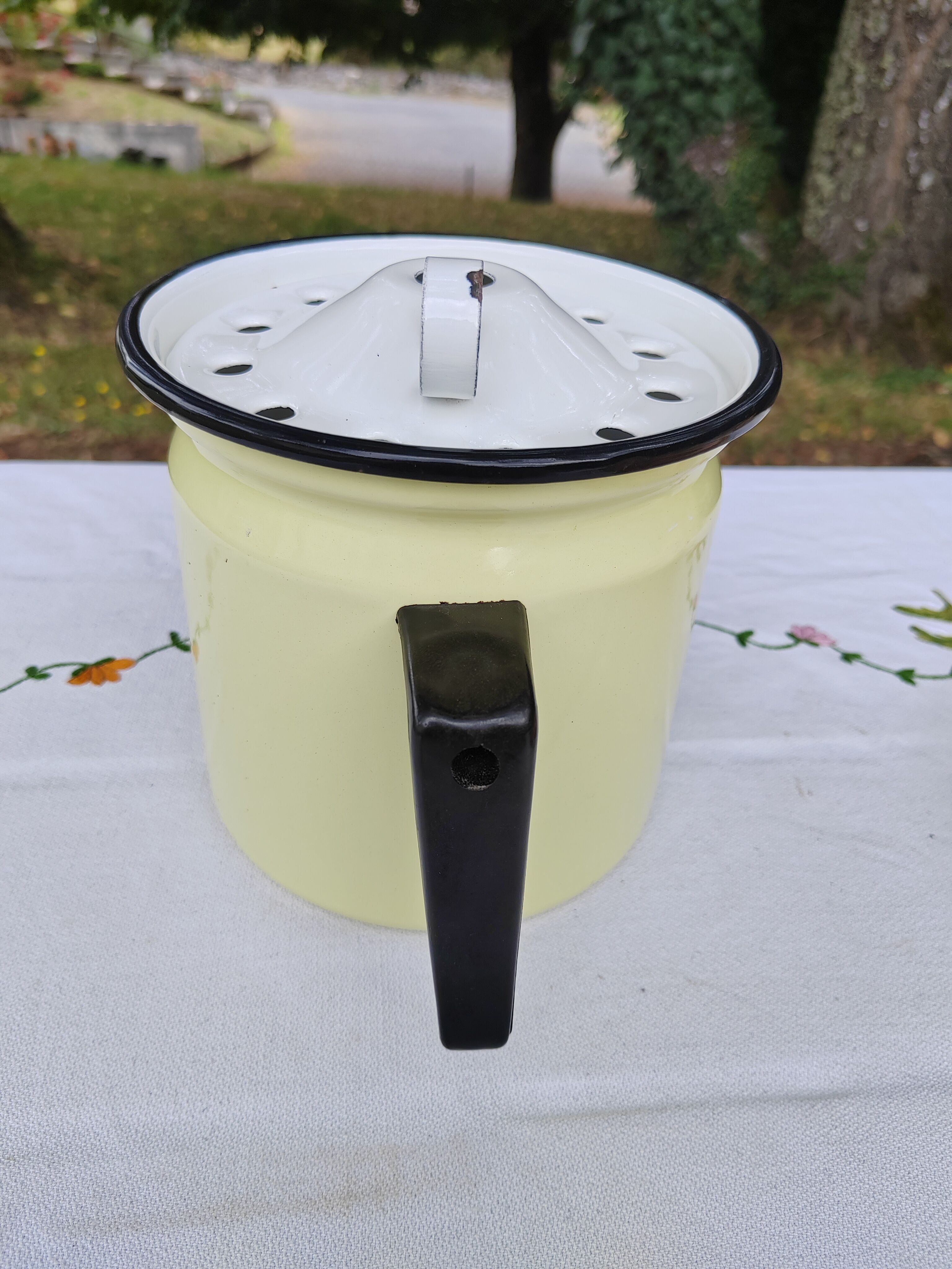 Yellow enamelled milk kettle