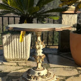 Carved and lacquered wooden side table.