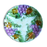 Old plate in slurry pattern grapes