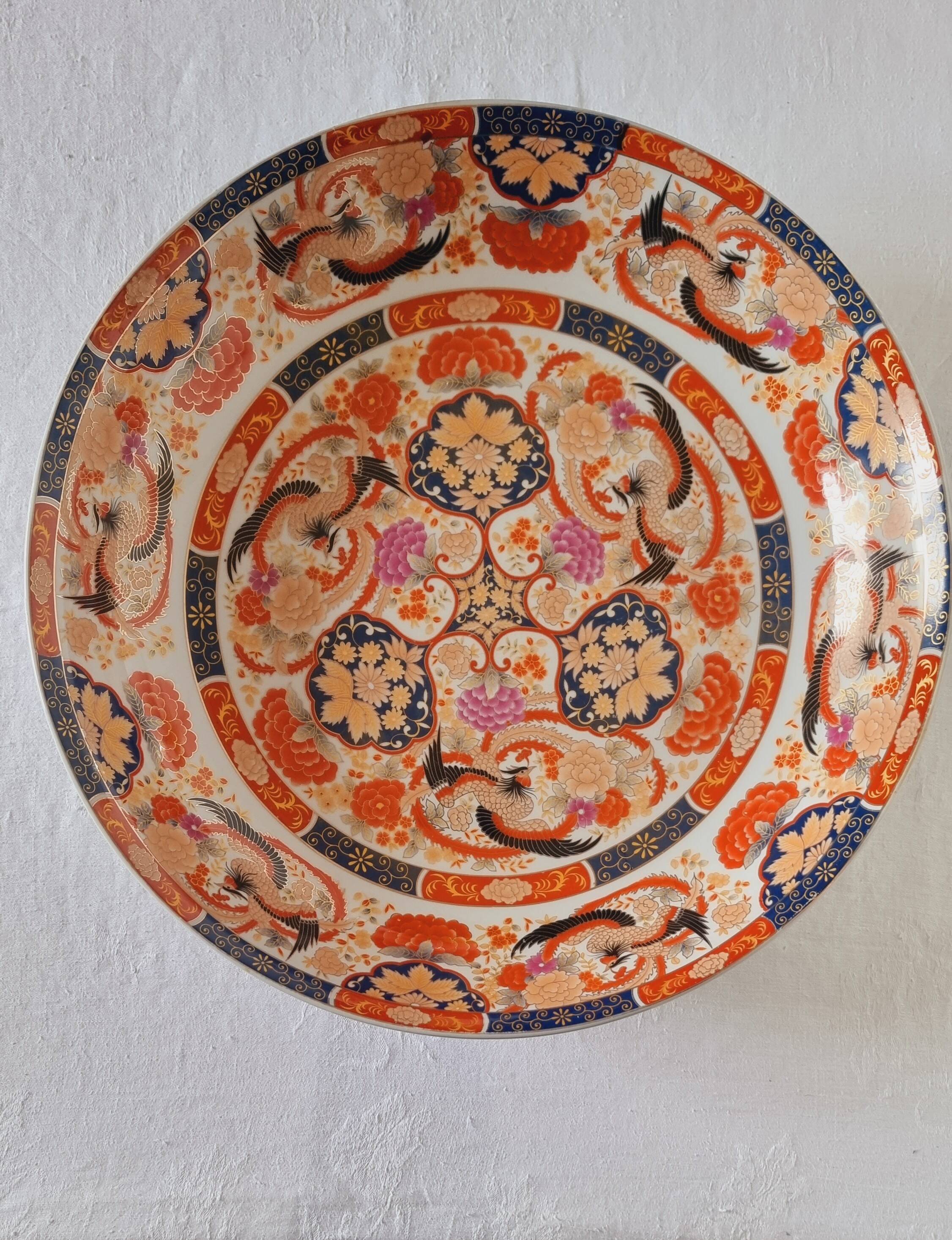 Large deep porcelain plate in Imari style (35.5 cm) with "Phe" decoration.