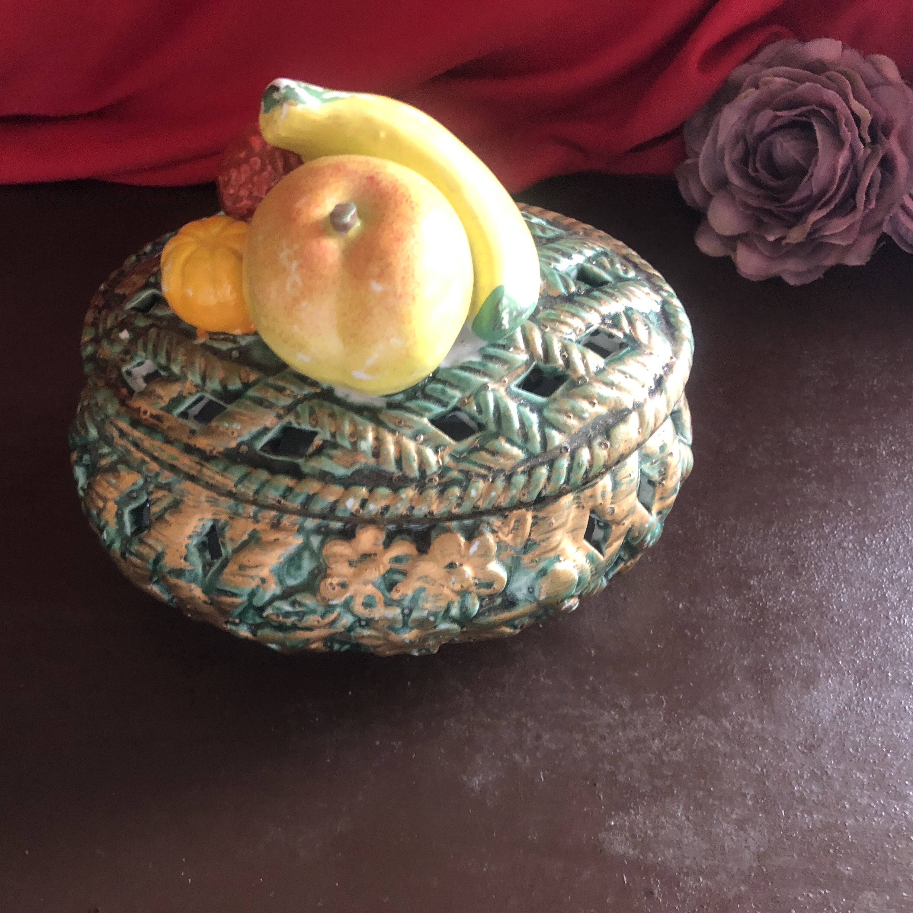 Openwork earthenware candy box with fruit slip