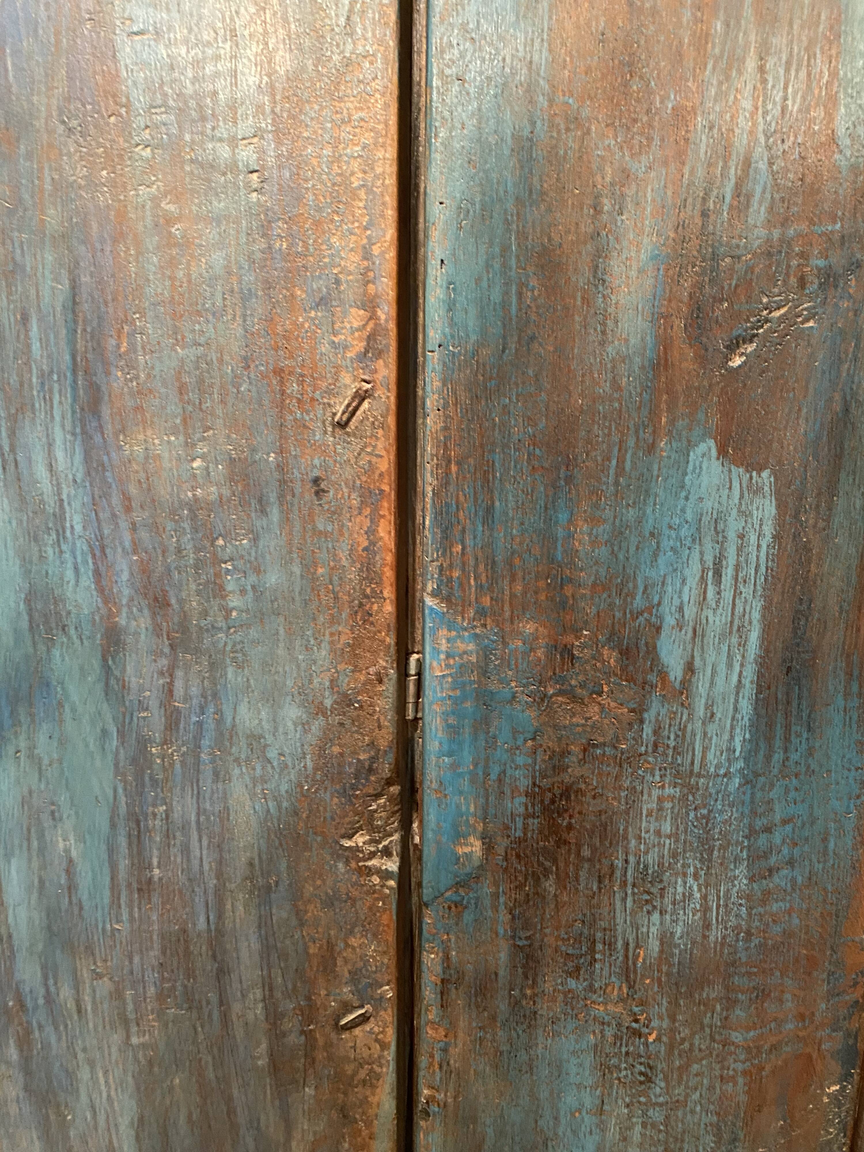 Old Indian window in blue lacquered wood