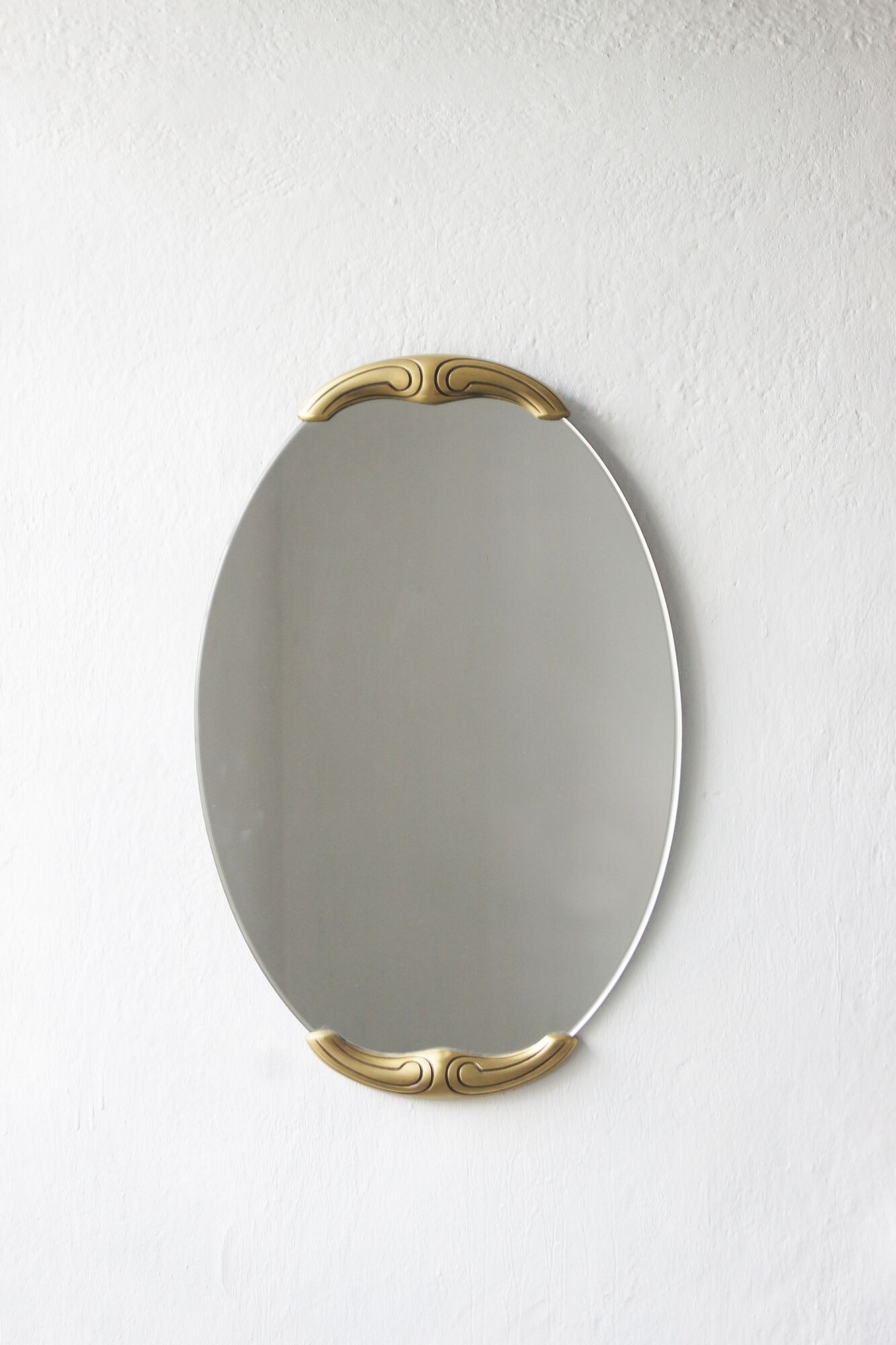 Miroir avec cadre en laiton 1960