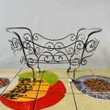 Metal doll's bed on vintage casters