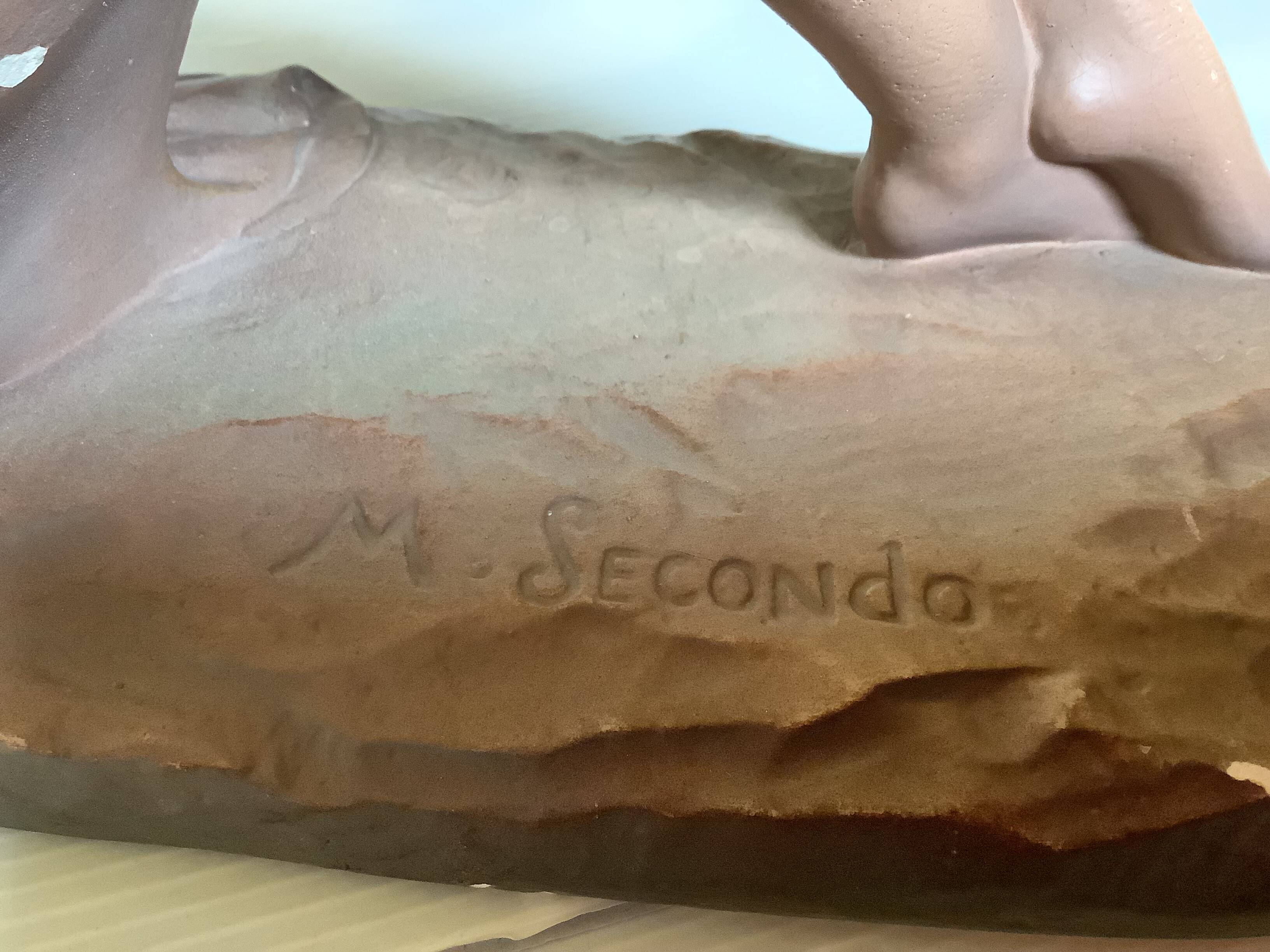 Art Deco statue of the woman with birds