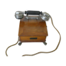 1910 model phone made of wood and metal