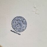 Antique serving dishes in iron earthenware