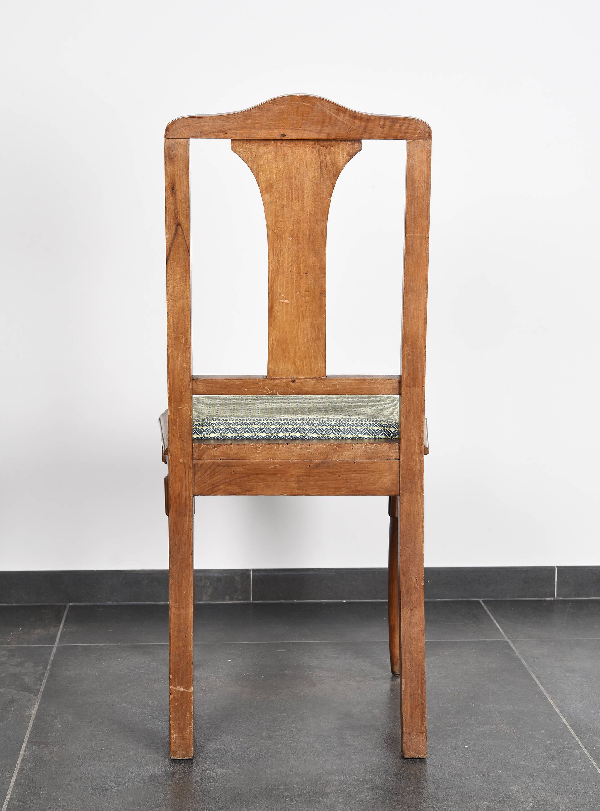 Set of 4 Art Deco chairs in carved wood.