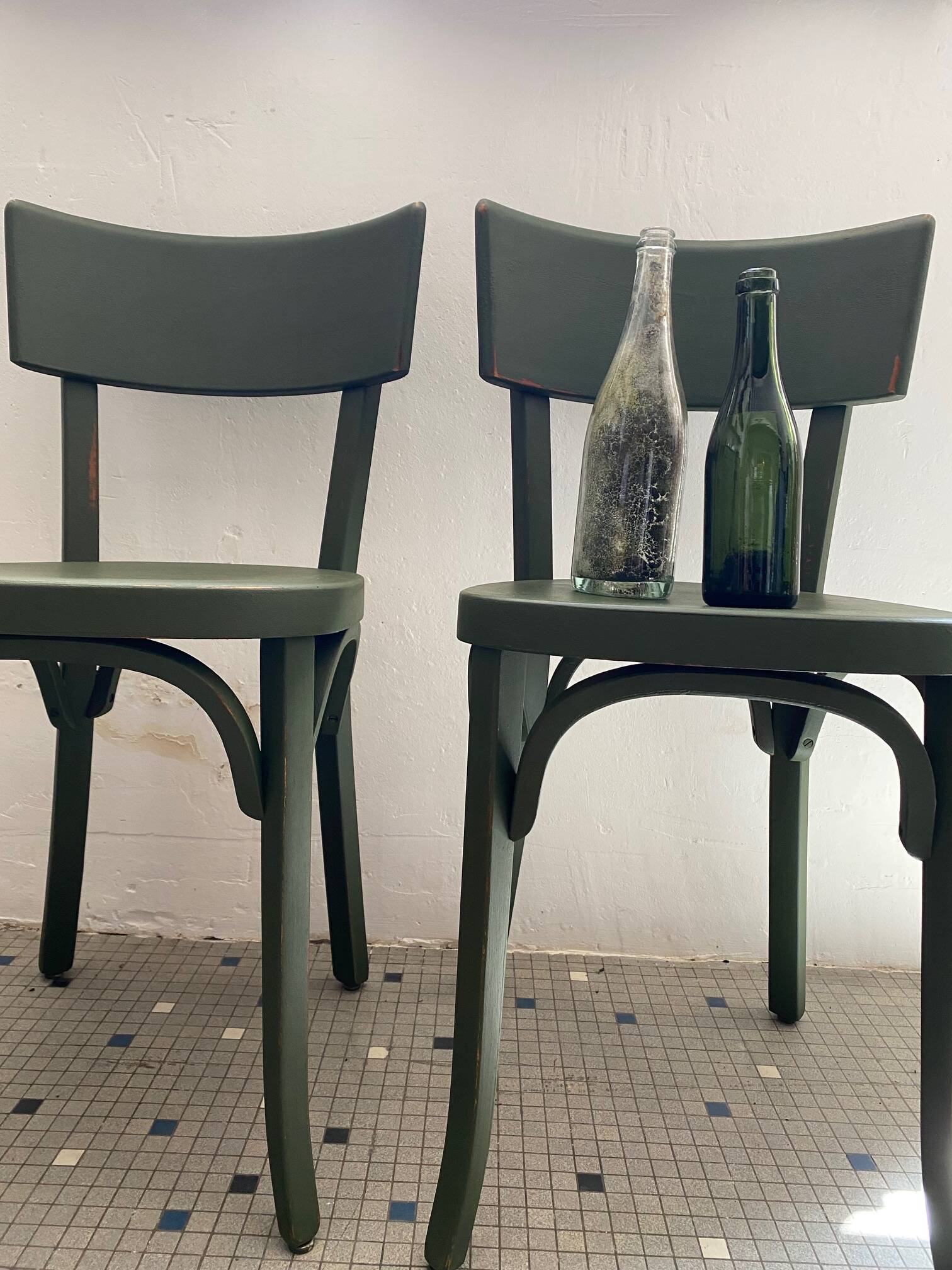 Pair of Baumann bottle green bistro chairs