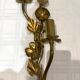 Paire d’appliques fleurs et feuilles laiton
